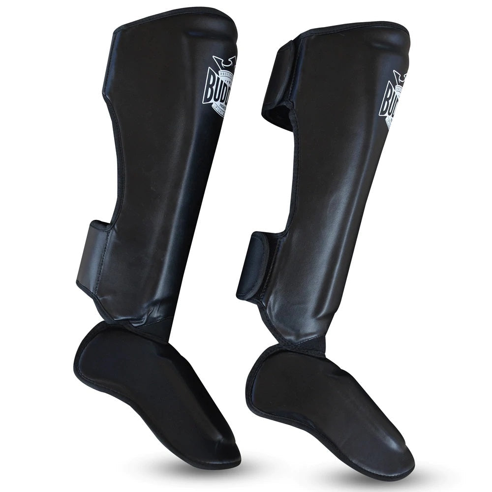 Vista lateral das caneleiras BUDDHA EPIC pretas para Kickboxing e Muay Thai
