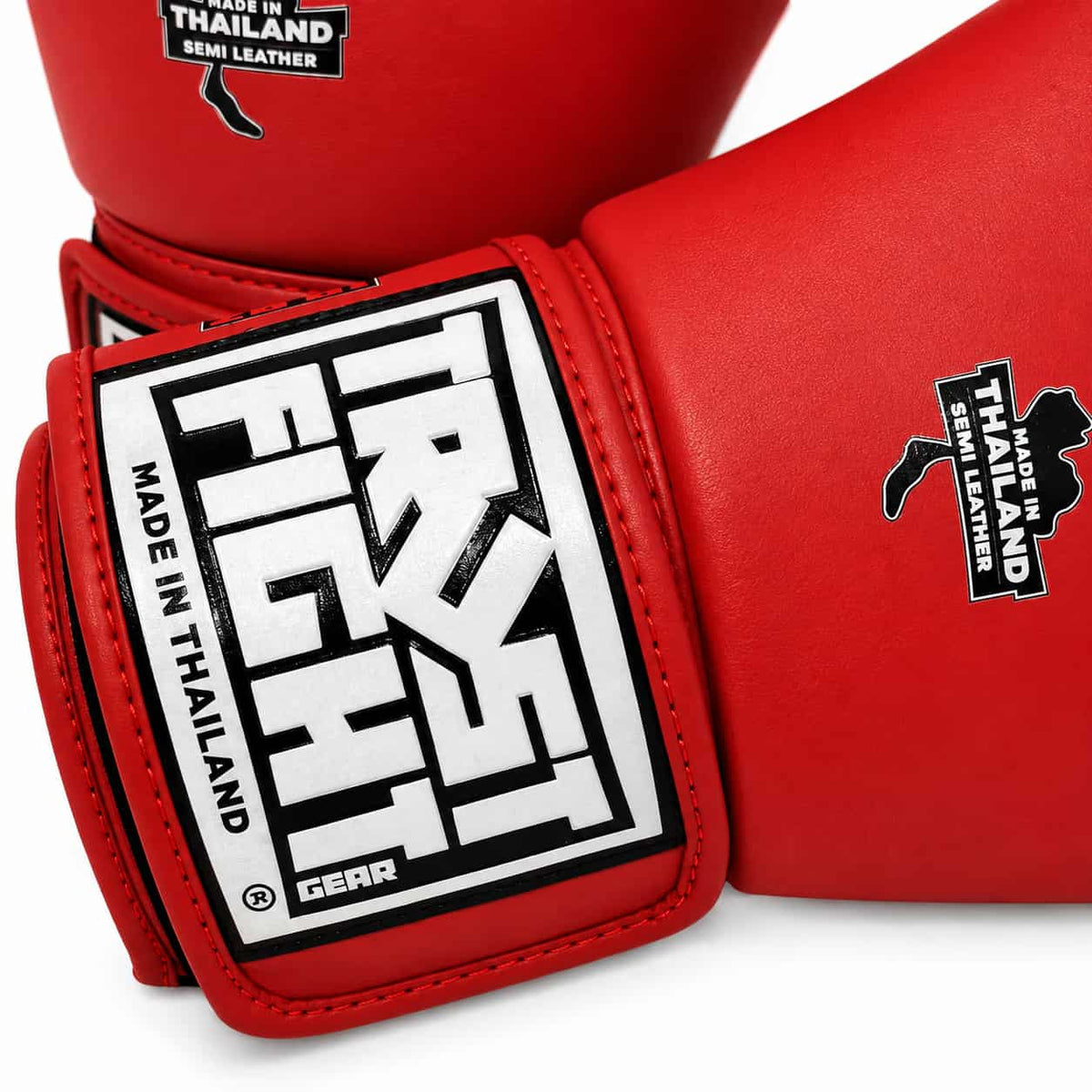 Luvas TRUST vermelhas para kickboxing, detalhe do velcro para um ajuste e proteção perfeitos