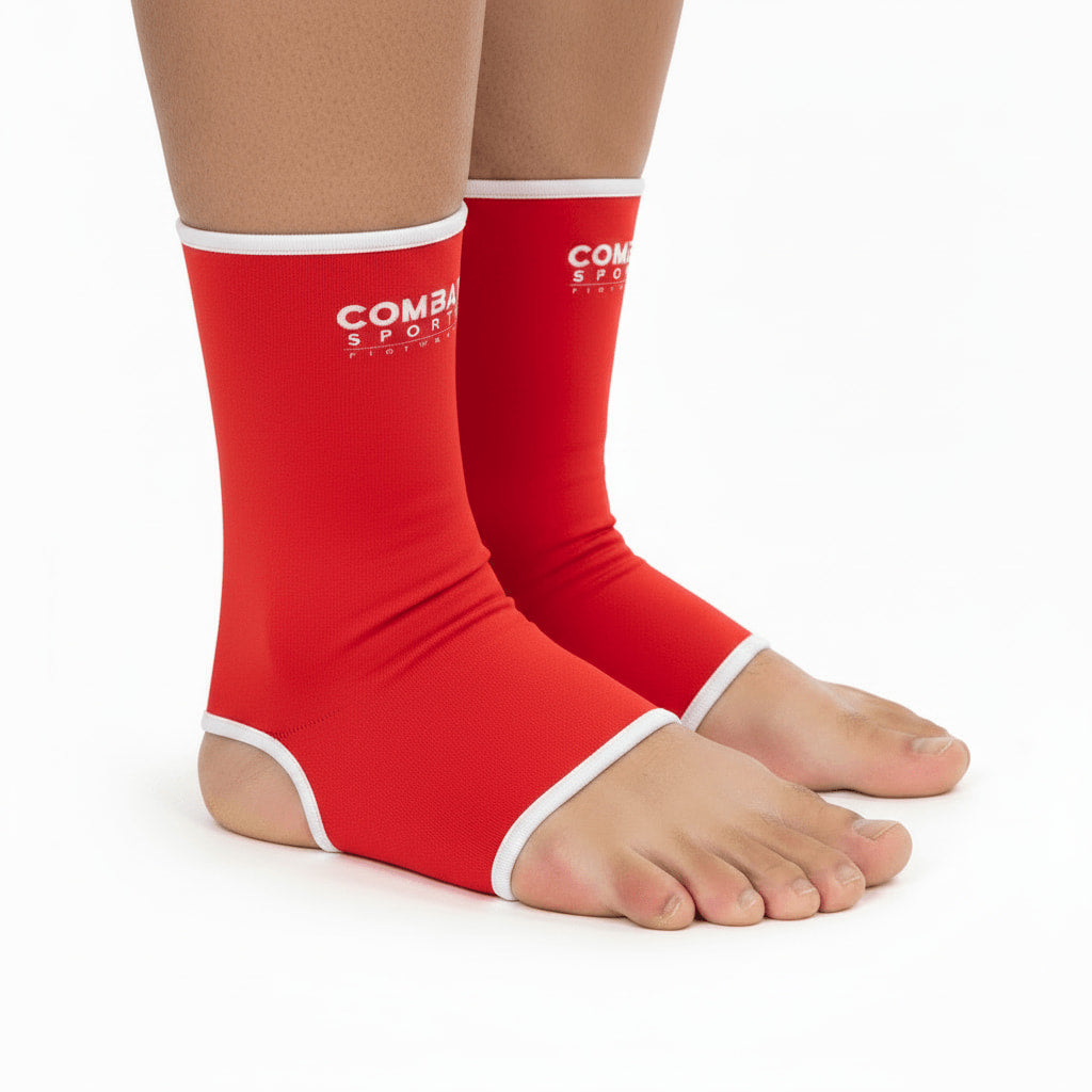 Pés elásticos Combatsports vermelhos para desportos de combate, vista de perfil.

