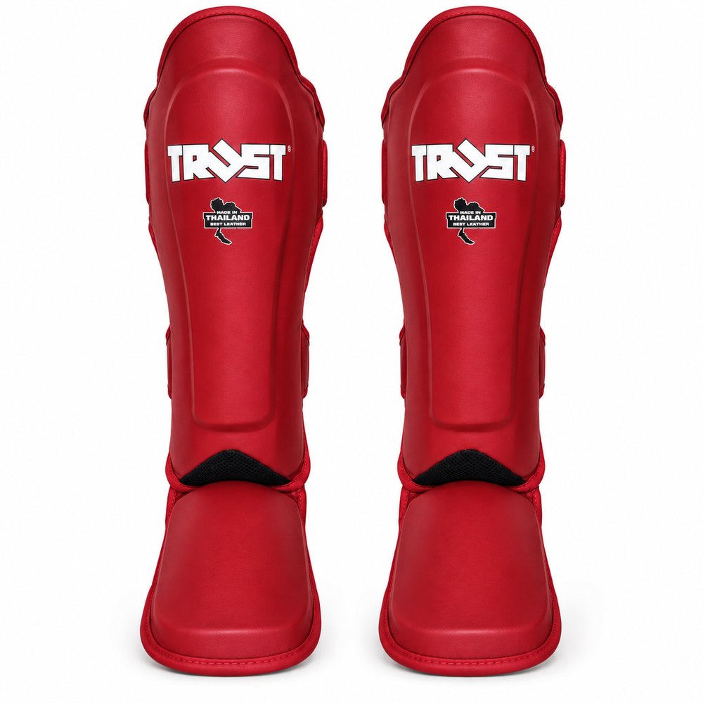 Par de caneleiras TRUST vermelhas para Kickboxing, Muay Thai e MMA, vista frontal
